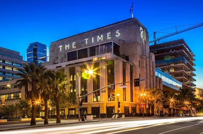 Photo of the facade of the Times Building in Los Angeles, highlighting its architectural design